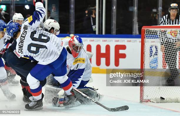 Charlie McAvoy of the United States scores past South Korea's goalkeeper Matt Dalton during the group B match USA vs South Korea of the 2018 IIHF Ice...