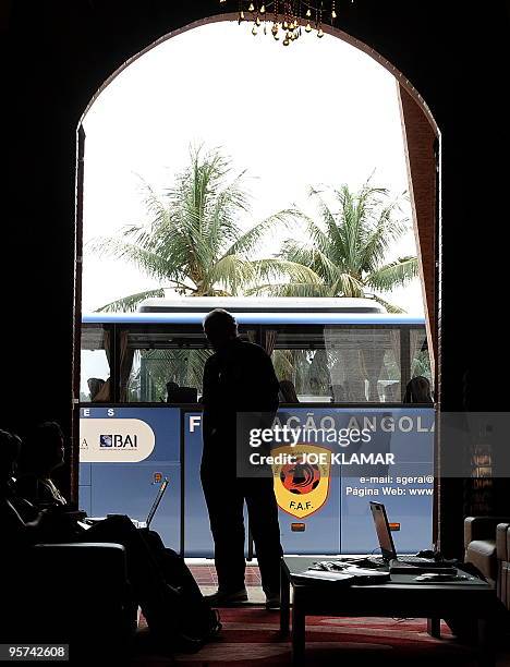 Angola's national football coach Manuel Jose prepares to speak to journalists during a press conference in hotel Calor Tropical during the African...