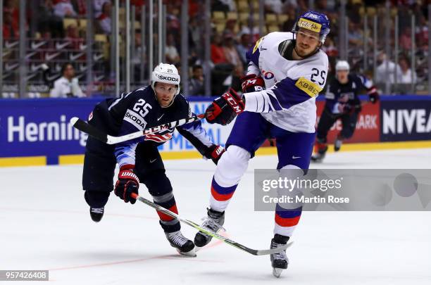 Blake Coleman of United States and Brock Radunske of Korea battle for the puck during the 2018 IIHF Ice Hockey World Championship group stage game...