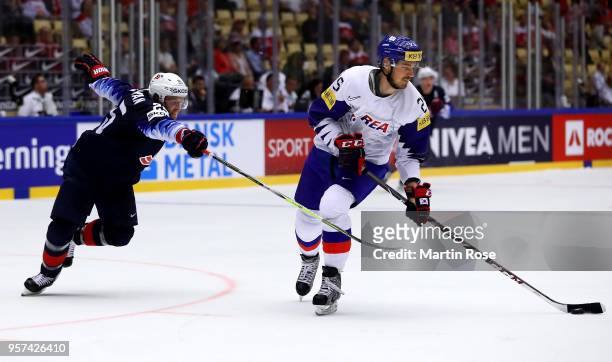 Blake Coleman of United States and Brock Radunske of Korea battle for the puck during the 2018 IIHF Ice Hockey World Championship group stage game...