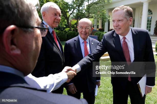 Sen. Orrin Hatch , Commerce Secretary Wilbur Ross and U.S. Trade Representative Robert Lighthizer visit following an announcement by President Donald...