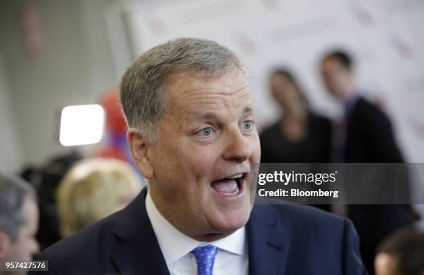 Doug Parker, chairman and chief executive officer of American Airlines Group Inc., speaks to attendees during an event to mark the opening of five...