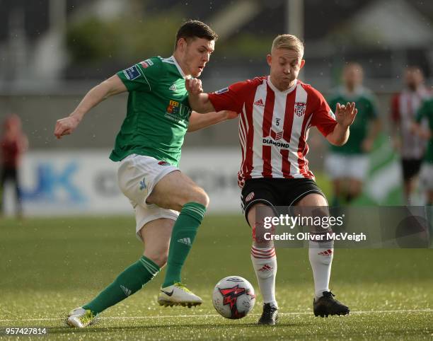 Derry , United Kingdom - 11 May 2018; Garry Buckley of Cork City in action against Nicky Low of Derry City match between Derry City and Cork City at...