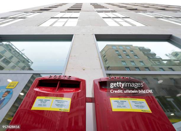 Mail boxes of the postal service Poste Italiane in Milan ,