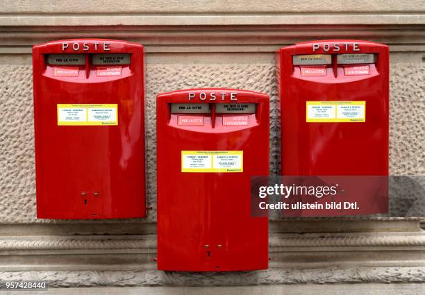 Mail boxes of the postal service Poste Italiane in Milan ,