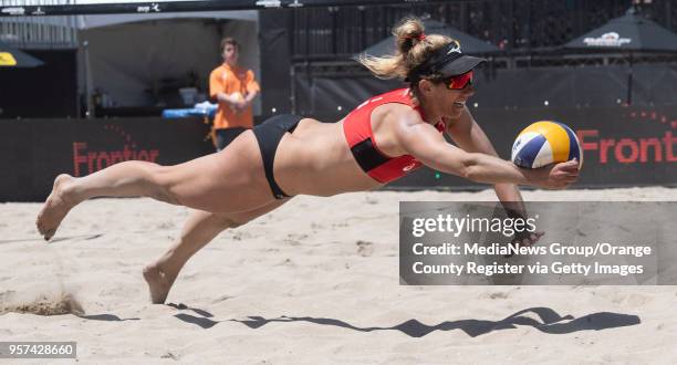 April Ross goes after a ball during the Huntington Beach Open on Thursday, May 3, 2018. Ross and teammate Alexandra Klineman won the match.