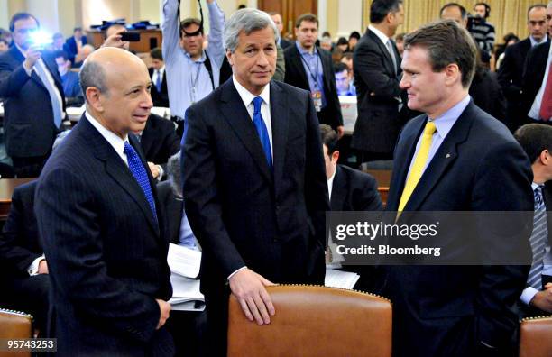 Lloyd Blankfein, chairman and and chief executive officer of The Goldman Sachs Group Inc., left, James "Jamie" Dimon, chairman, president, and chief...