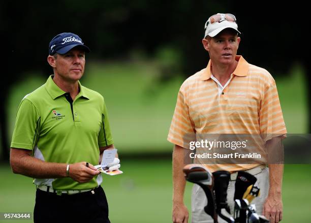 Golfer James Kingston of South Africa and South African cricketer Shaun Pollock during the pro - am at the Joburg Open at Royal Johannesburg and...