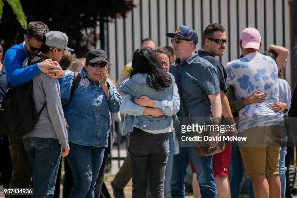 Students are reunited with friends and family after a shooting at Highland High School on May 11, 2018 in Palmdale, California. A 14-year-old male...
