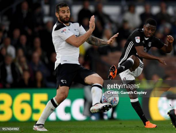 Floyd Ayite of Fulham shots past Bradley Johnson of Derby County during the Sky Bet Championship Play Off Semi Final:First Leg match between Derby...