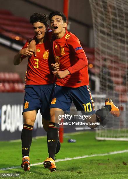 Nabil Touaizi of Spain congratulates Miguel Gutierrez of Spain on his goal during the UEFA European Under-17 Championship Group Stage match between...