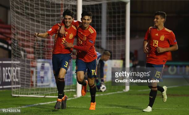 Nabil Touaizi of Spain congratulates Miguel Gutierrez of Spain on his goal during the UEFA European Under-17 Championship Group Stage match between...