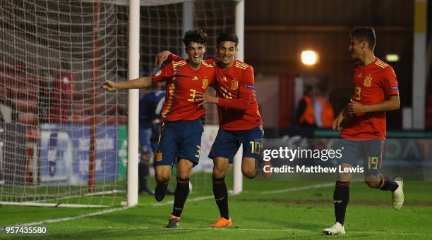 Nabil Touaizi of Spain congratulates Miguel Gutierrez of Spain on his goal during the UEFA European Under-17 Championship Group Stage match between...