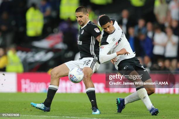 Aleksandar Mitrovic of Fulham and Curtis Davies of Derby County during the Sky Bet Championship Play Off Semi Final:First Leg match between Derby...