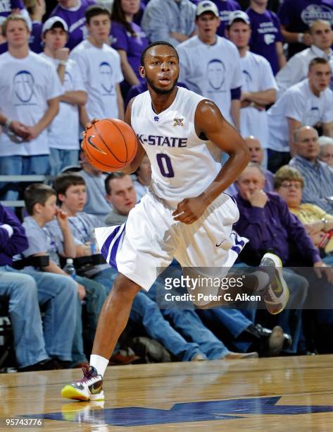 Guard Jacob Pullen of the Kansas State Wildcats brings the ball up court during a game against the Texas A&M Aggies on January 12, 2010 at Bramlage...