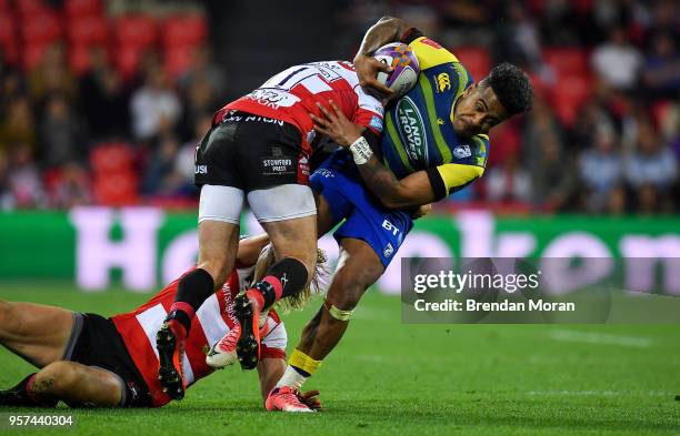 Bilbao , Spain - 11 May 2018; Rey Lee-Lo of Cardiff Blues is tackled by Henry Trinder and Billy Twelvetrees of Gloucester Rugby during the European...