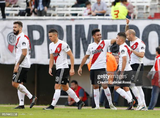 Javier Pinola of River Plate celebrates with teammates after scoring the first goal of his team during a match between River Plate and Estudiantes de...