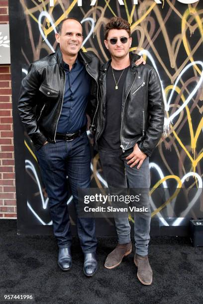 Marcus Lemonis and JGoldcrown attend the MARCUS meatpacking grand opening Event at Marcus Meat Packing on May 10, 2018 in New York City.