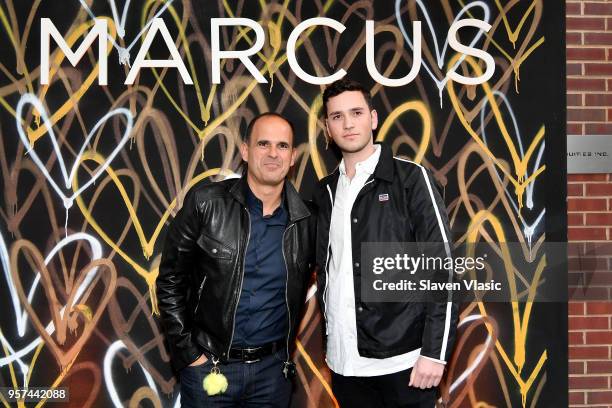Marcus Lemonis and a guest attend the MARCUS meatpacking grand opening Event at Marcus Meat Packing on May 10, 2018 in New York City.