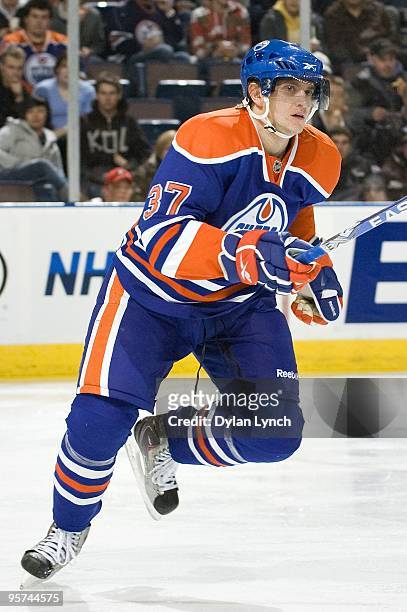 Denis Grebeshkov of the Edmonton Oilers follows the play against the Phoenix Coyotes at Rexall Place on January 5, 2010 in Edmonton, Alberta, Canada....