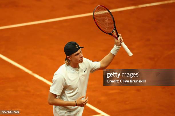 Denis Shapvalov of Canada celebrates match point against Kyle Edmund of Great Britain in their singles match during day seven of Mutua Madrid Open at...