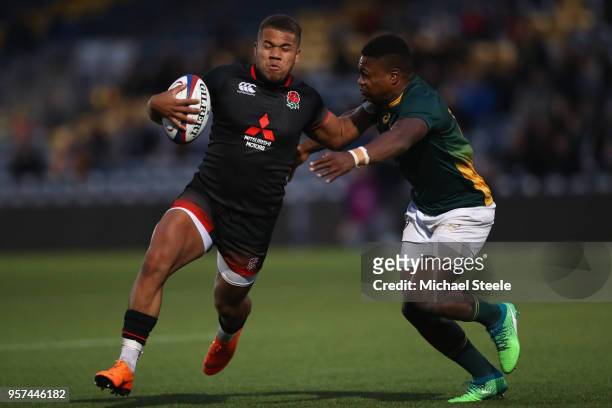 Ollie Lawrence of England takes on Wandisile Simelane of South Africa during the International match between England U20's and South Africa U20's at...