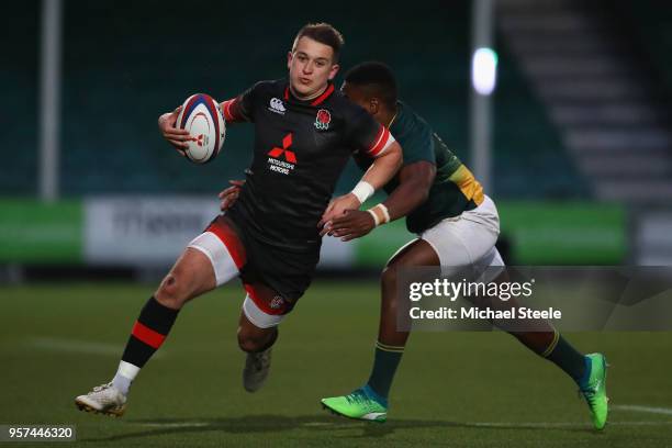 Tom Parton of England cuts past Wandisile Simelane of South Africa tackles during the International match between England U20's and South Africa...