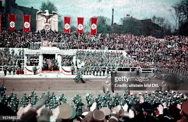 Parade of the Wehrmacht on Hitler's 50th birthday on the Ost-West-Achse in Berlin - view of the VIP box; behind Hitler, fr. The l: Hermann Göring,...