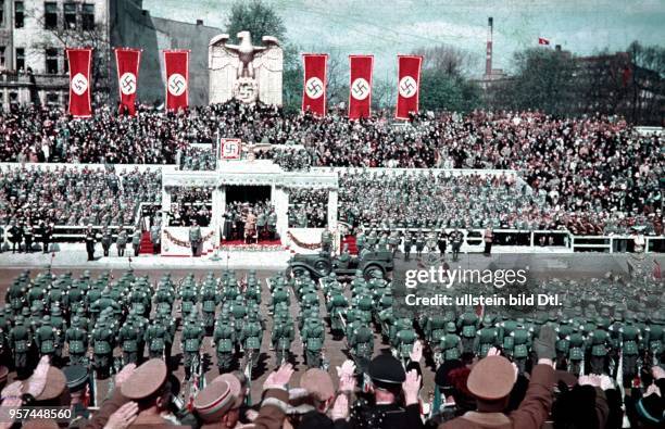 Parade of the Wehrmacht on Hitler's 50th birthday on the Ost-West-Achse in Berlin - view of the VIP box; behind Hitler, fr. The l: Hermann Göring,...