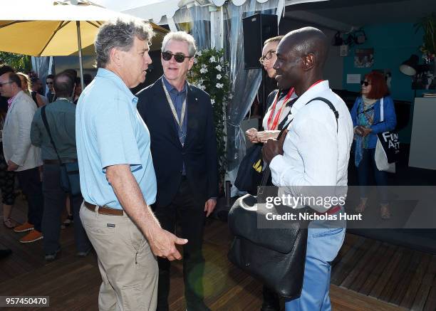 Tom Bernard and Piers Handling, Yasmin Rams and Rodney Charles attend the TIFF & OMDC cocktail event at the Cannes Film Festival on May 11, 2018 in...