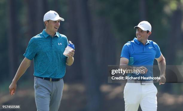 Jordan Spieth of the United States and Rory McIlroy of Northern Ireland walk on the tenth hole during the second round of THE PLAYERS Championship on...