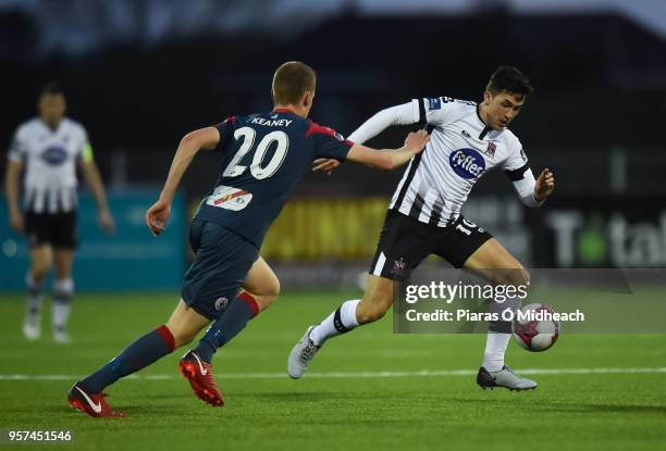 Louth , Ireland - 11 May 2018; Jamie McGrath of Dundalk in action against Jack Keaney of Sligo Rovers during the SSE Airtricity League Premier...