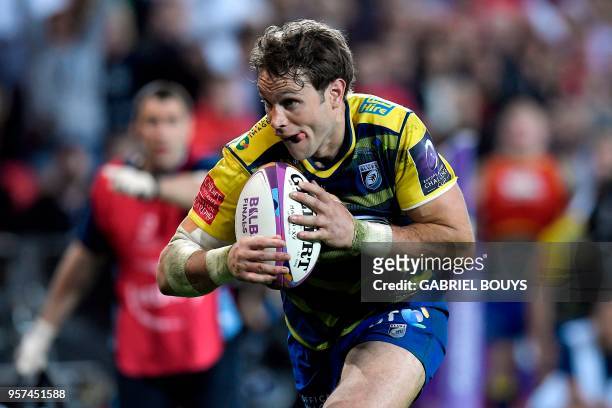 Cardiff Blues' US wing Blaine Scully scores a try during the 2018 European Challenge Cup final rugby union match between Cardiff Blues and Gloucester...