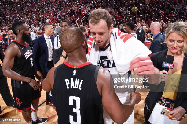 Chris Paul of the Houston Rockets hugs Joe Ingles of the Utah Jazz after the game in Game Five of the Western Conference Semifinals of the 2018 NBA...