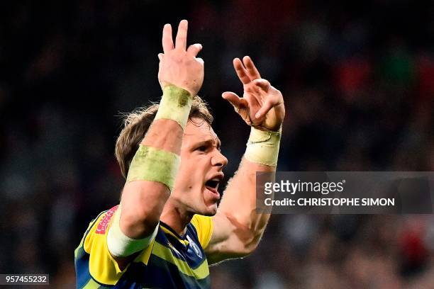 Cardiff Blues' US wing Blaine Scully celebrates after scoring a try during the 2018 European Challenge Cup final rugby union match between Cardiff...