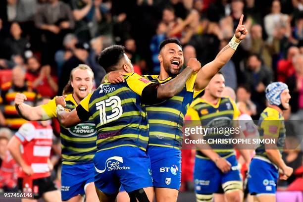 Cardiff Blues players celebrate after winning the 2018 European Challenge Cup final rugby union match against Gloucester at the San Mames Stadium in...