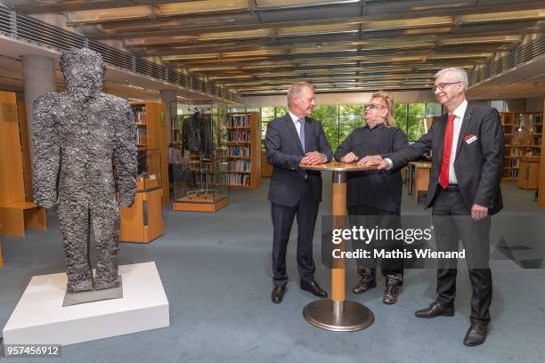 Bernard M. Kemper, Artist HA Schult, Dr. Dietmar Preissler present HA Schult environment sculpture 'Slag Man' at Haus der Geschichte Bonn on May 11,...