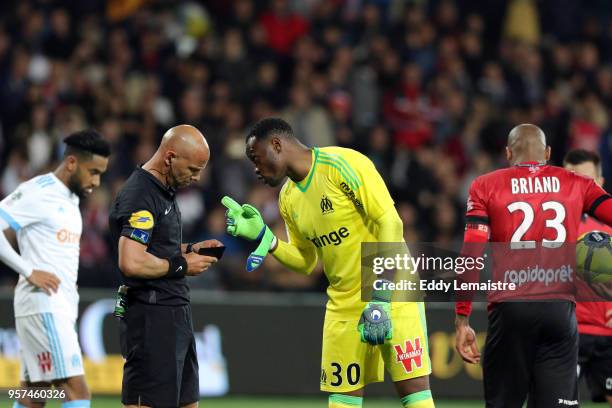 Red card for Steve Mandanda of Marseille during the Ligue 1 match between EA Guingamp and Olympique Marseille at Stade du Roudourou on May 11, 2018...