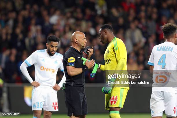 Red card for Steve Mandanda of Marseille during the Ligue 1 match between EA Guingamp and Olympique Marseille at Stade du Roudourou on May 11, 2018...