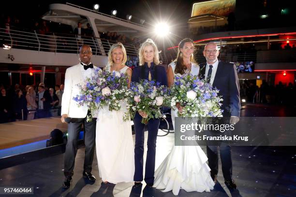 Yared Dibaba, godmother Laura Ludwig, Wybcke Meier , godmother Kira Walkenhorst wearing a dress by Lever Couture and Stephan Zimmermann during the...