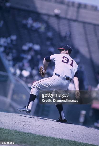 Pitcher Dean Chance of the Los Angeles Angels throws a pitch during the second game of a doubleheader on June 20, 1965 against the Cleveland Indians...