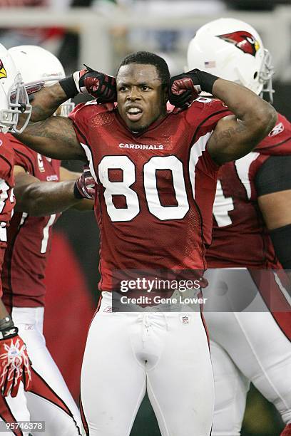 Arizona Cardinals wide receiver Early Doucet celebrates a touchdown during a wild card playoff game against the Green Bay Packers at University of...