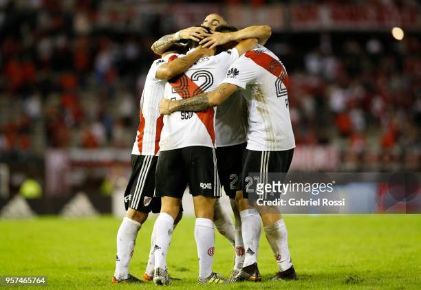 Ignacio Scocco of River Plate celebrates with teammates after scoring the second goal of his team during a match between River Plate and Estudiantes...