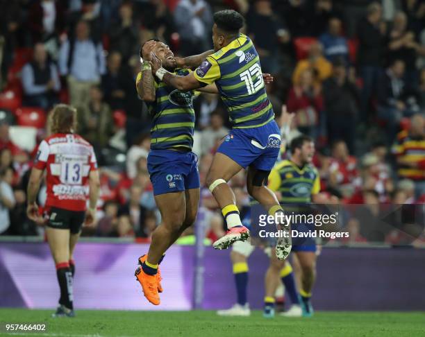 Rey Lee-Lo and Willis Halaholo of Cardiff celebrate their victory during the European Rugby Challenge Cup Final match between Cardiff Blues v...