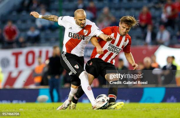 Javier Pinola of River Plate fights for the ball with Facundo Sanchez of Estudiantes during a match between River Plate and Estudiantes de La Plata...