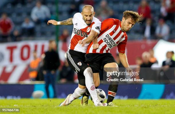 Javier Pinola of River Plate fights for the ball with Facundo Sanchez of Estudiantes during a match between River Plate and Estudiantes de La Plata...