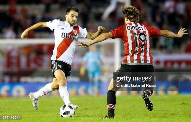 Ignacio Scocco of River Plate fights for the ball with Sebastian Dubarbier of Estudiantes during a match between River Plate and Estudiantes de La...