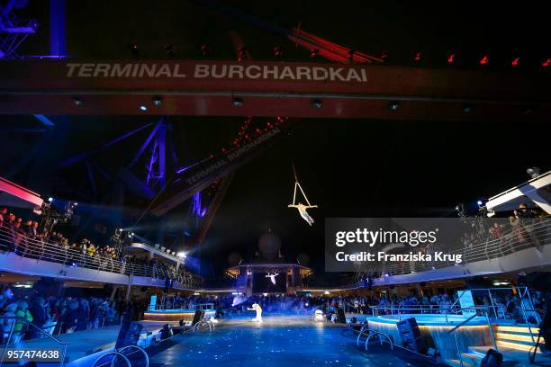 Aerial acts during naming ceremony of the cruise ship 'Mein Schiff 1' at Terminal Burchardkai on May 11, 2018 in Hamburg, Germany.