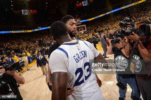Anthony Davis of the New Orleans Pelicans hugs Draymond Green of the Golden State Warriors after the game in Game Five of the Western Conference...