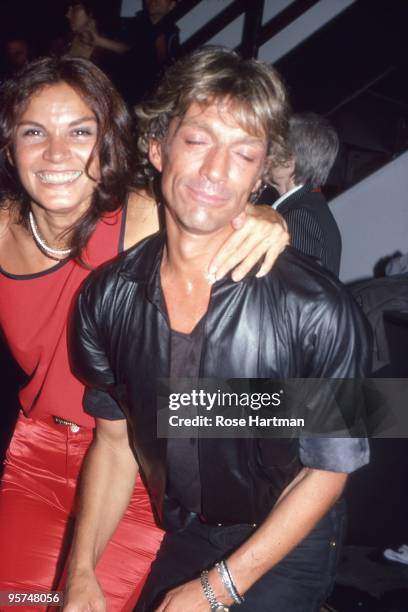 Actress Florinda Bolkan and designer Giorgio Sant 'Angelo at Studio 54 in 1980 in New York City, New York.